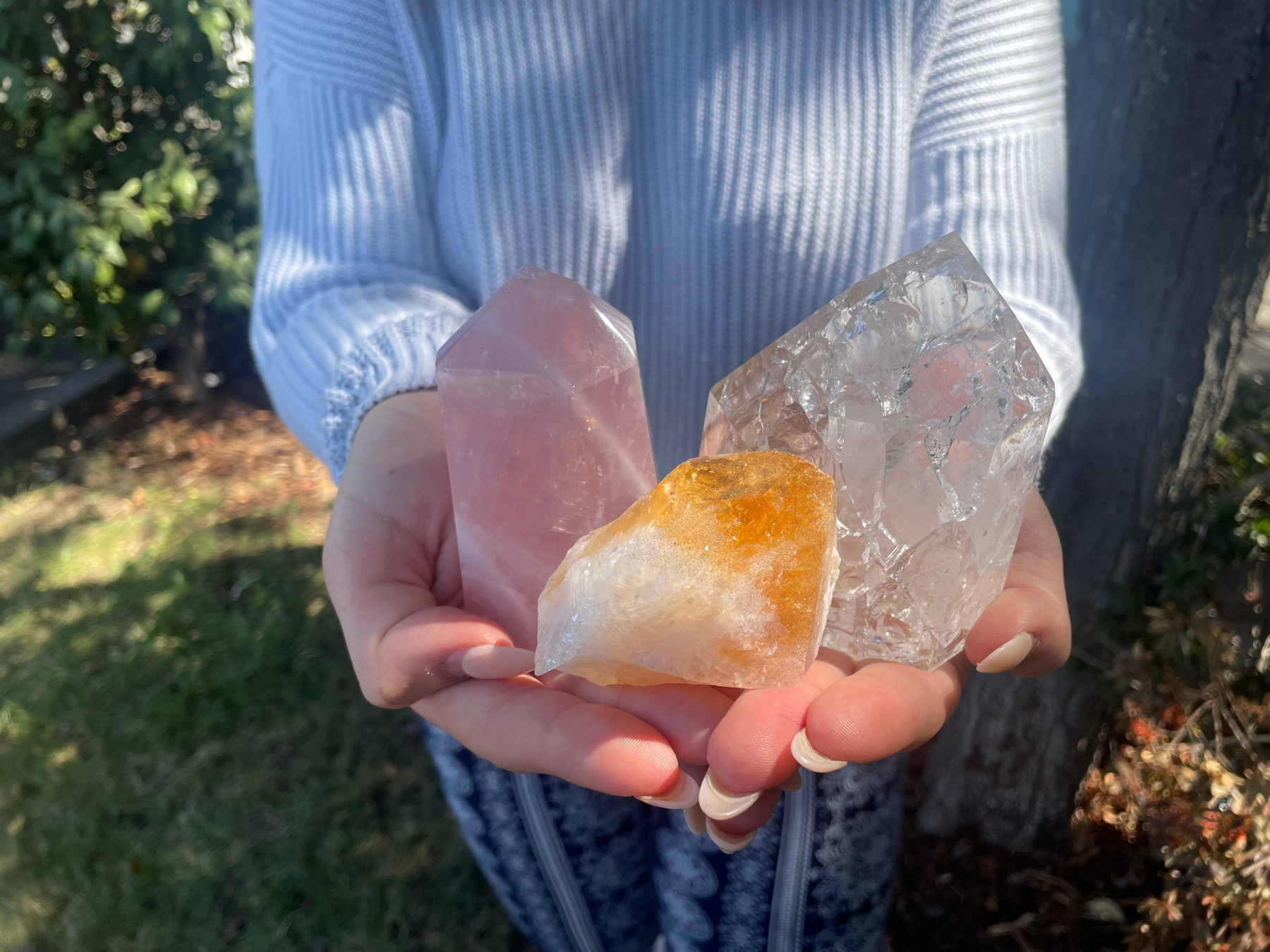 Person holding crystals in their hands